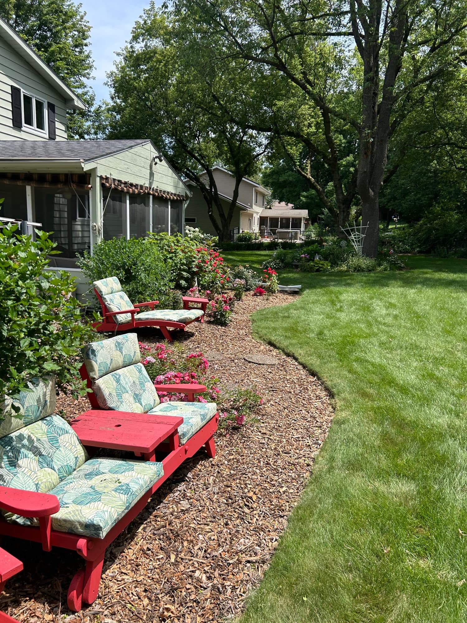 Mulch bed edging along the patio