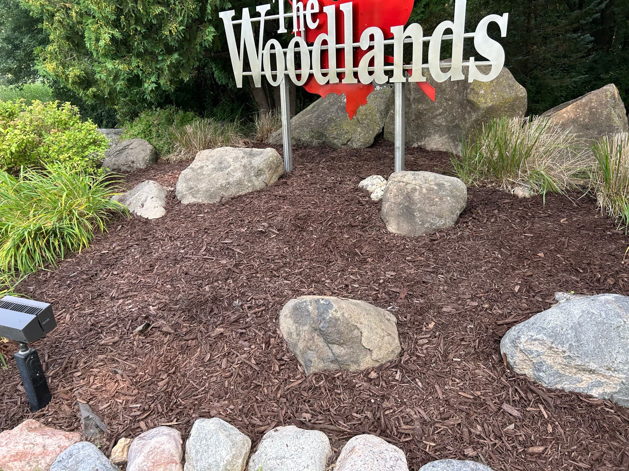 Fresh mulch & boulder placement